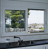 Συρόμενο ενεργειακό επάλληλο τζάμι-σήτα