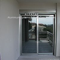 Συρόμενο ενεργειακό επάλληλο τζάμι